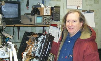 Alan repairing a VCR.