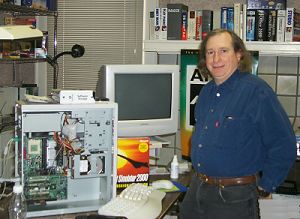 Alan repairing a computer.